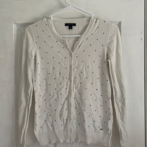 White cardigan with gray embroidered dots